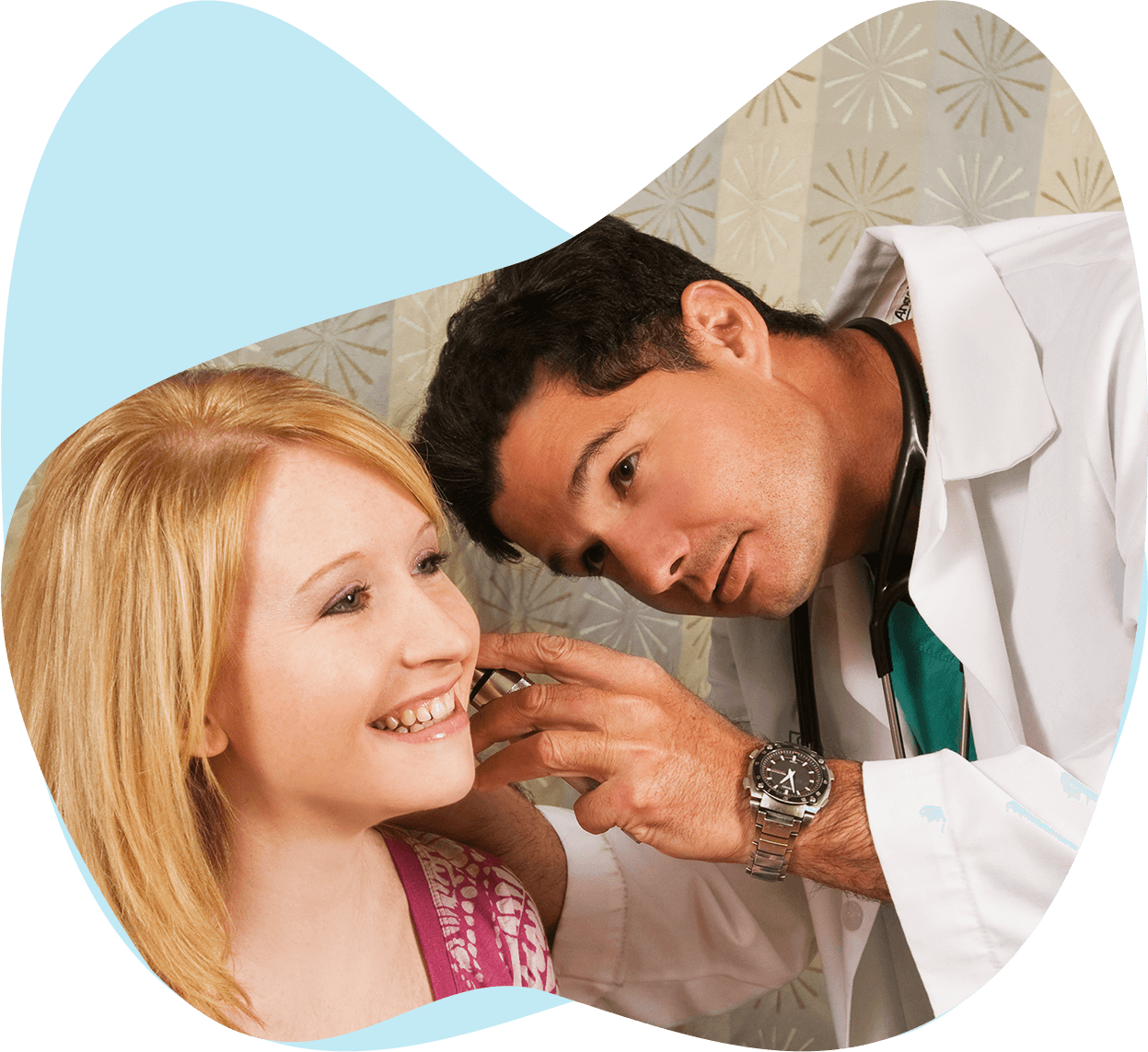 Clinician examining a patient's ear
